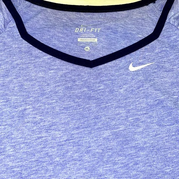 Nike short sleeved dri-fit women’s XL fits like a large. - Picture 2 of 9